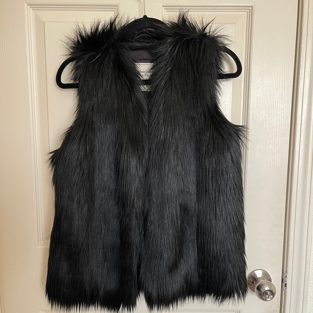 Sleveless Coat